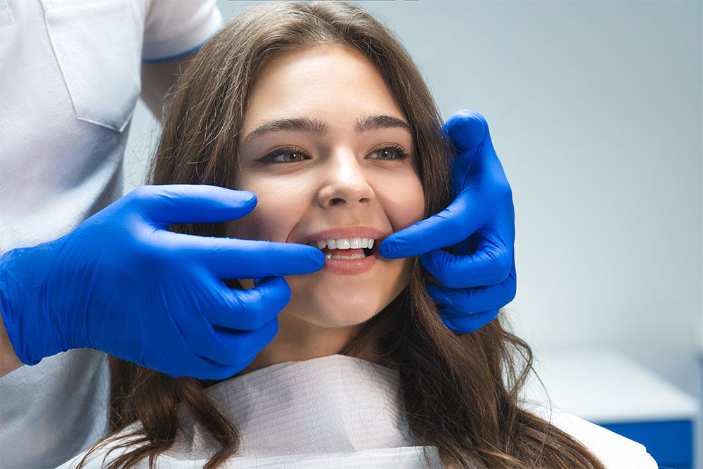 Female patient matching shade for a porcelain dental crown
