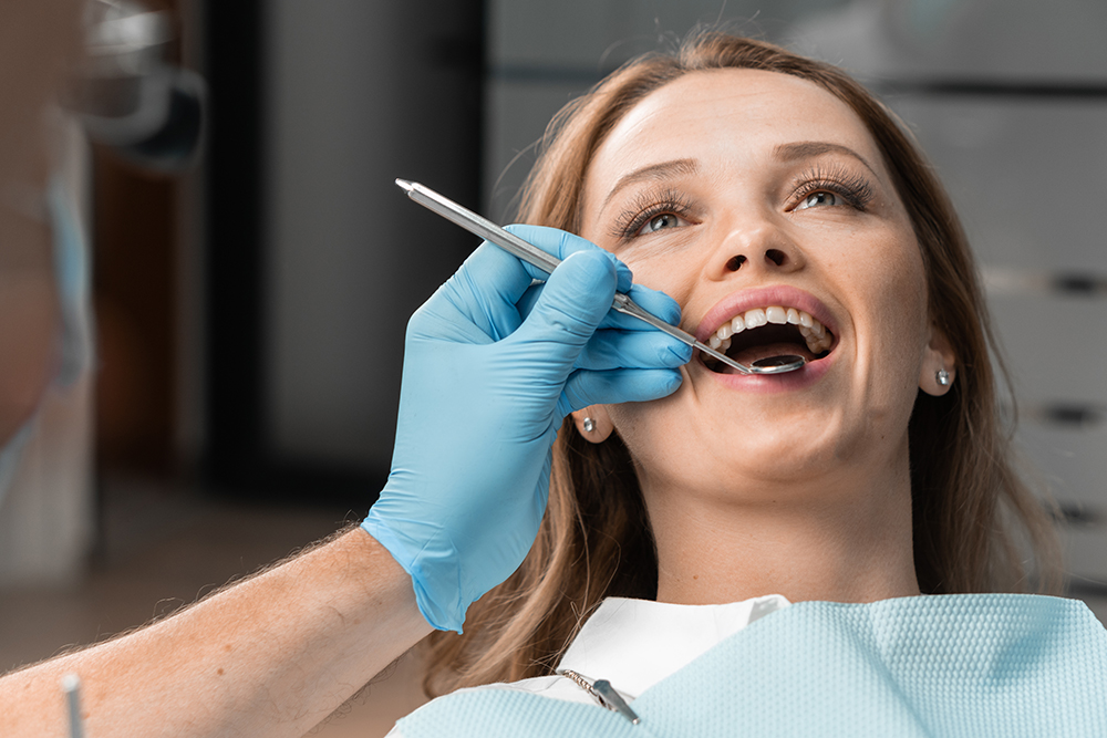 Close-up of a woman’s smile during dental examination